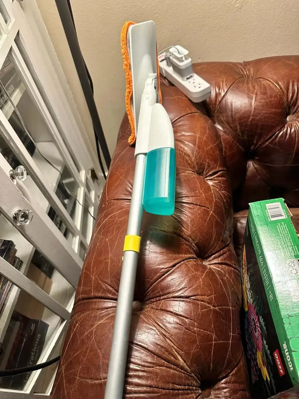Lovevery Squeeze and Spray Mop from The Storyteller Play Kit